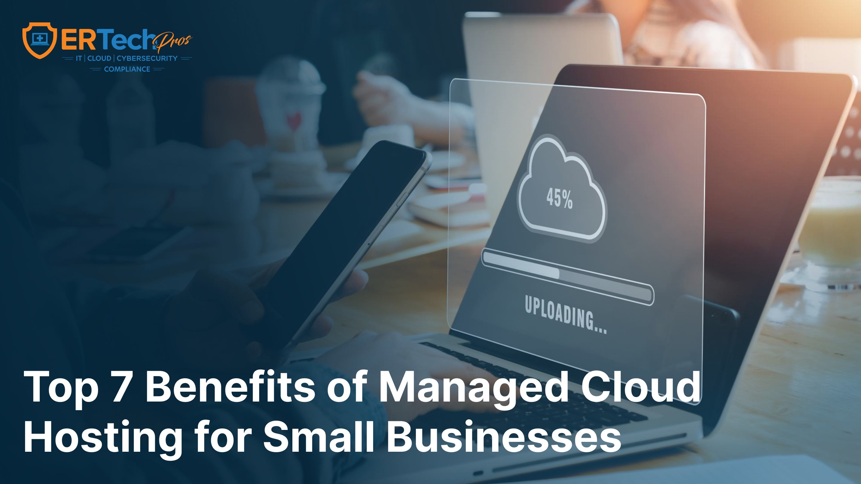 A team reviewing a secure cloud hosting dashboard for SMBs with ER Tech Pros